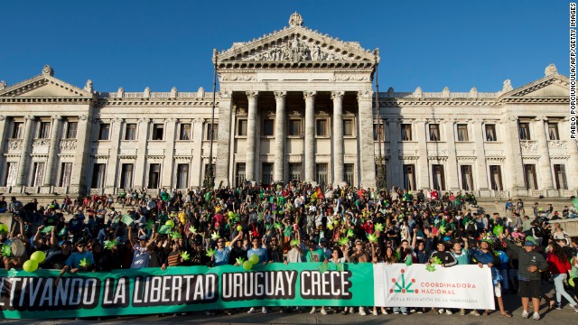 Supporters of legalizing marijuana demonstrate outside Uruguay's Senate.