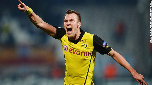 Kevin Grosskreutz scored a late goal for Borussia Dortmund against Marseille to give the German side a vital win in Champions League Group F. The 2-1 victory coupled with Arsenal's 2-0 loss against Napoli means last year's beaten finalists finish top of the group.