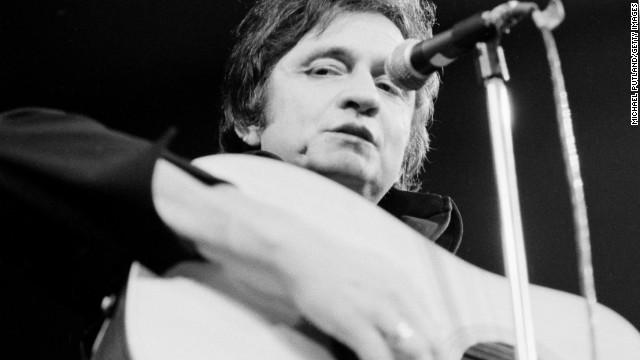 Johnny Cash performs at the Royal Albert Hall in London in September 1972. Click through the gallery to see photos from Cash's life and career.