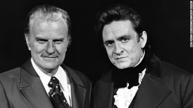 Billy Graham, left, and Cash appear on "The Johnny Cash Show" on February 24, 1971.