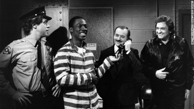 Joe Piscopo, from left, Eddie Murphy, Brian Doyle-Murray, and Johnny Cash perform a "Saturday Night Live" skit on April 17, 1982.