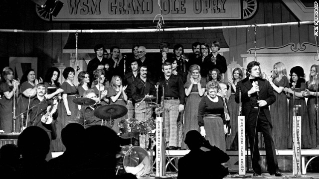 Country music stars including Johnny Cash, right, perform during the Grand Ole Opry's last show at the Ryman Auditorium in Nashville on March 18, 1974.