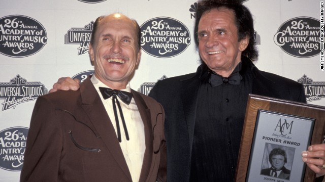 Robert Duvall, left, appears with Johnny Cash during the 26th annual Academy of Country Music Awards in Universal City, California, in 1991.