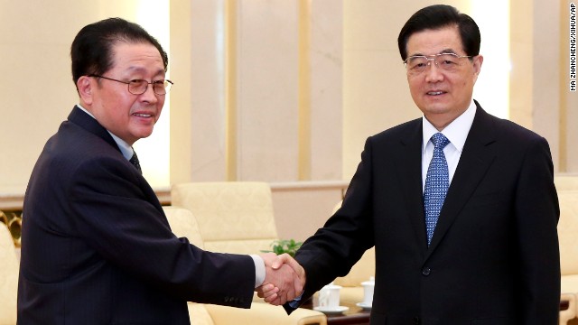 Chinese President Hu Jintao, right, greets Jang in Beijing on August 17, 2012. Jang met China's President and Premier in an effort to improve the relations between the two countries after Kim Jong Un irked Beijing with a rocket launch soon after taking power.
