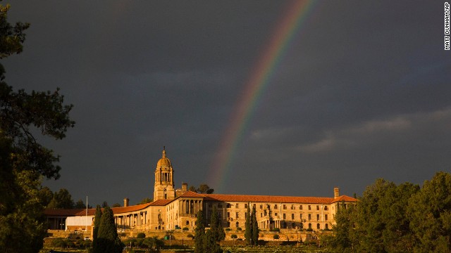 A rainbow forms over the Union Buildings in Pretoria on Thursday, December 12, after the public viewing of Mandela's casket. 