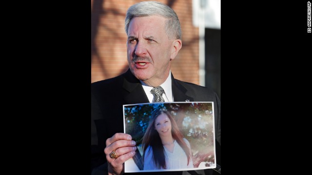 Arapahoe County Sheriff Grayson Robinson holds a picture of Davis at a press conference on Saturday, December 14, after identifying her as the victim of the shooting at Arapahoe High School the day before. 