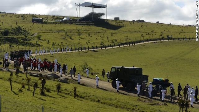 The casket arrives for the ceremony in Qunu on December 15.