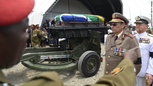 The casket leaves the funeral ceremony for burial in Qunu.