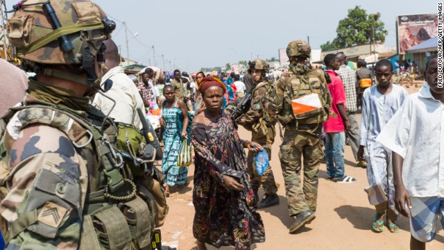 French troops patrol a street of the Muslim PK-5 district in Bangui on December 16.