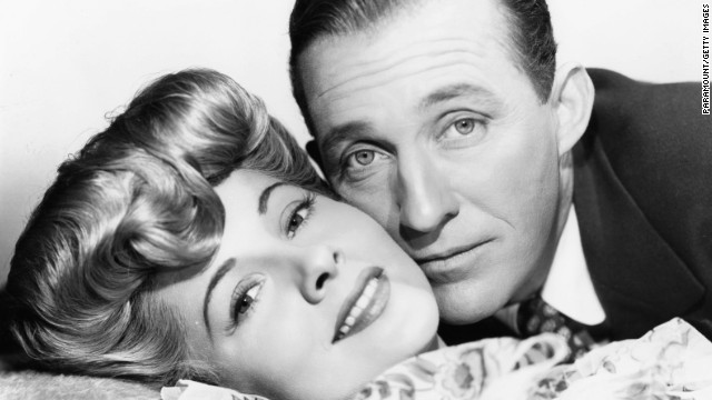 Fontaine and Bing Crosby, cheek to cheek in a scene from the film "The Emperor Waltz" in 1948.