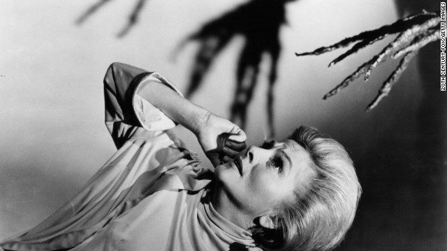 Fontaine appears scared of the branch-like hand coming at her in a scene from the 1966 film "The Devil's Own."