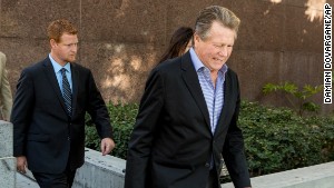 Actor Ryan O\'Neal, center, and son, Redmond O\'Neal, exit court for a lunch break on Thursday, December 12, 2013, in Los Angles. 