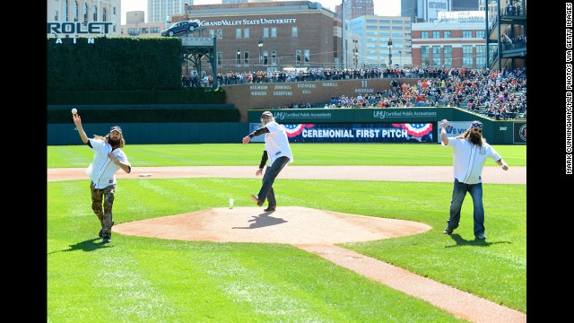 Jase, Si and Willie throw out the ceremonial first pitch before a Major League Baseball game in Detroit in September.