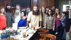 S.E. Cupp, with the Robertson family, featured in \