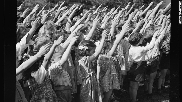 Southington, Connecticut school children pledge their allegiance to the flag, in May 1942.