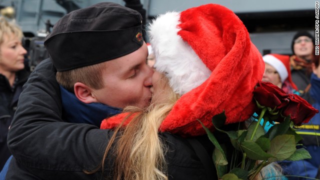 Petty Officer Second Class Sven Gruner is greeted by his girlfriend Rebecca Ankem at the Frigate Niedersachsen, docked after returning to Wilhelmshaven, Germany, on Friday, December 20, from a five-month anti-pirate operation off the Horn of Africa.