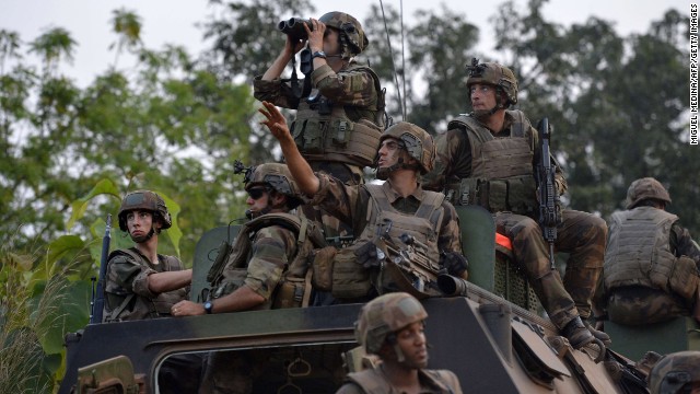 French troops patrol the Boy Rabe district of Bangui on December 20.