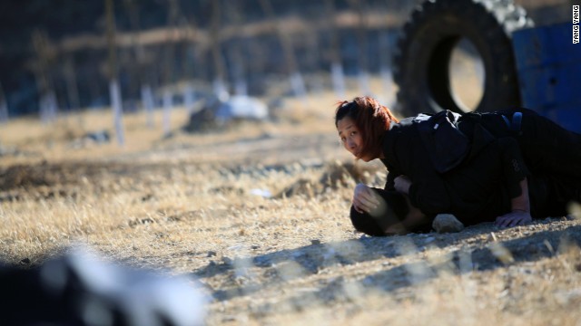 A female recruit during training at the Tianjiao International Security Academy in Beijing.
