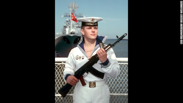 A Russian sailor stands guard with an AK-47 in Moscow during a visit from then-U.S. President Ronald Reagan in 1988.