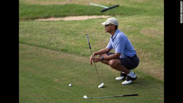 President Barack Obama golfs in Kailua, Hawaii, on Monday, December 23, while on a two-week vacation. Here's a look at how Obama and other presidents have escaped from the pressure of the Oval Office. 