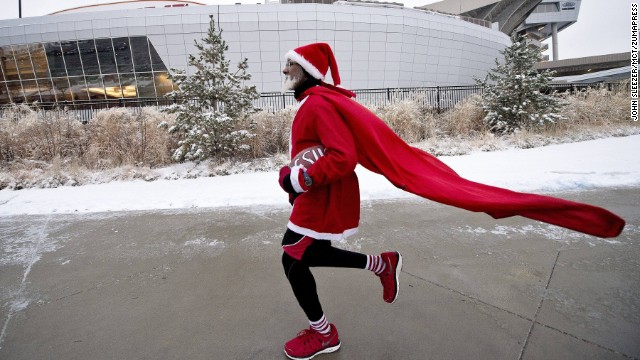 Michael Wheeler of Kansas City, makes one of his seven laps around Arrowhead Stadium on Sunday, December 22, before the game between the Kansas City Chiefs and Indianapolis Colts. The 63-year-old marathon runner performs this ritual before each Chiefs home game.