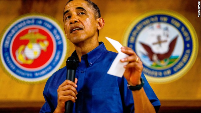 Obama signs budget, defense bills in Hawaii