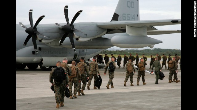 Japan-based Marines board an aircraft for areas hit by Typhoon Haiyan hit in the Philippines at Marine Corps Air Station Futenma on November 10. 