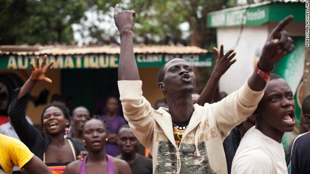 Angry Christians shout at a truck of fleeing Muslims in the Gobongo neighborhood of Bangui on Friday, December 27. 