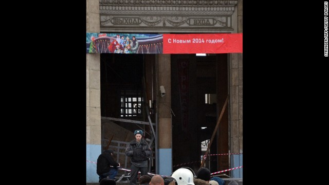 An officer stands guard outside the station.