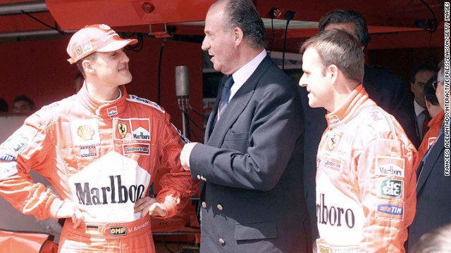 King Juan Carlos of Spain congratulates Schumacher after he won the Spanish Formula 1 Grand Prix in 2001.