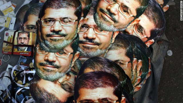 Mohamed Morsy masks are displayed for sale at the base for supporters of the ousted president on July 12, 2013 in Cairo, Egypt. The country has been in a state of political paralysis following the ousting of former president and Muslim Brotherhood leader Morsy by the military.