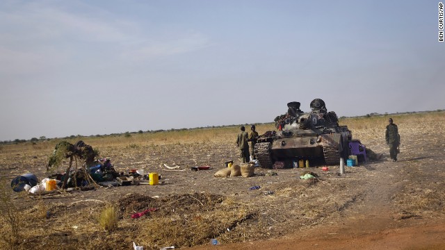 South Sudanese government soldiers man a tank near the airport in Malakal, South Sudan, on Monday, December 30.