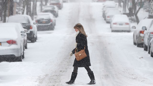 A woman walks through snowy conditions in Albany on January 2.