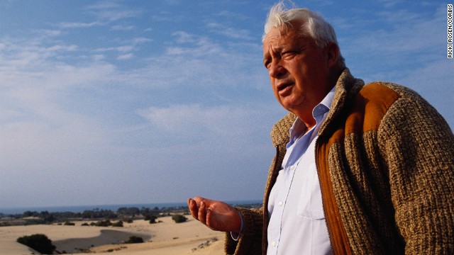 Sharon, no longer in the Israeli military, stands at the future site of a settlement in Gaza in February 1990. 