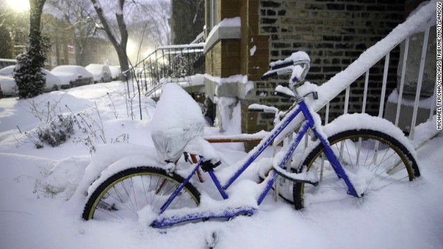 Snow covers bikes along Leavitt Street in Chicago's Wicker Park on January 2.