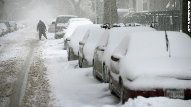 Snow covers cars in Chicago's Humboldt Park neighborhood on January 2.