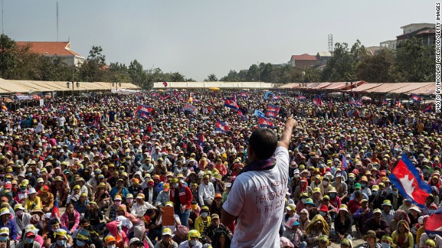 A Cambodia National Rescue Party supporter address crowds at Freedom Park on December 29, 2013 in Phnom Penh, Cambodia.