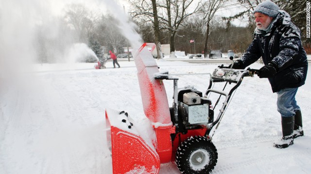A man uses his snowblower to clear some paths in Mansfield, Connecticut, on January 3.