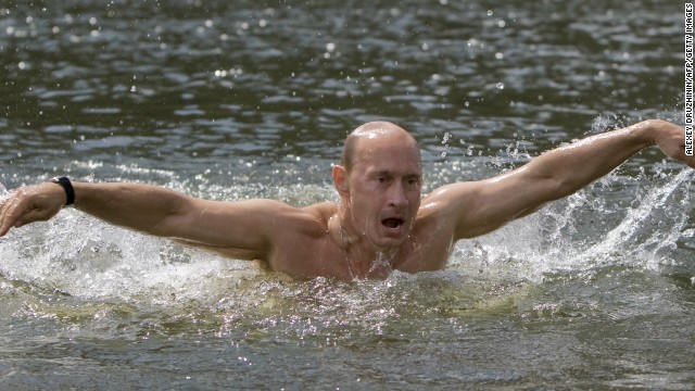 Putin braved the waters in southern Siberia during a vacation to show off his swimming skills.