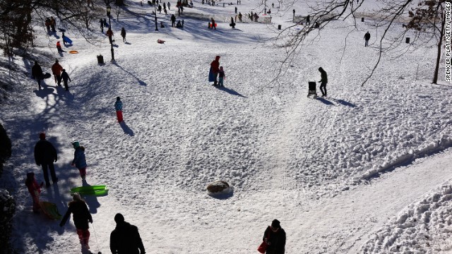 People go sledding in Prospect Park in Brooklyn, New York, on Saturday, January 4.