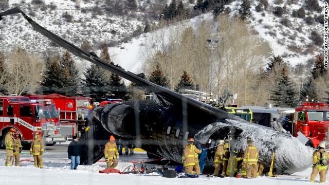 Emergency crews respond to the scene of a small plane that crashed upon landing at the Aspen-Pitkin County Airport in Aspen, Colorado, on Sunday, January 5.