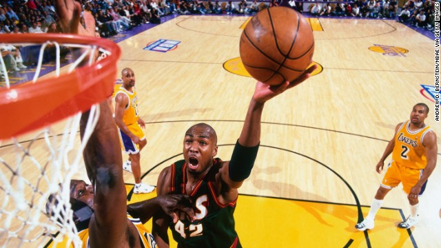 Vin Baker shoots the basketball during a 1998 playoff game in Los Angeles. Baker is one of seven former NBA players taking part in the game in North Korea, according to Rodman's agent, Darren Prince. Baker was a four-time NBA All-Star who averaged 15 points a game during a 13-year career that ended in 2006.
