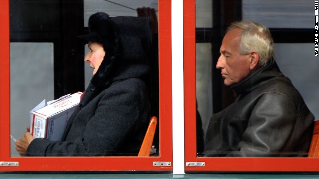 People ride a street car in New Orleans as temperatures in the area plummeted below freezing on January 7.