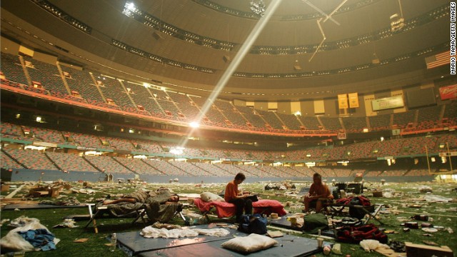 In 2005, displaced victims of Hurricane Katrina rest inside a shelter set up at the Superdome in New Orleans. Advocacy groups estimate homelessness in the city more than doubled in the aftermath of the storm. The disaster fueled dialogue on poverty and race relations in America.