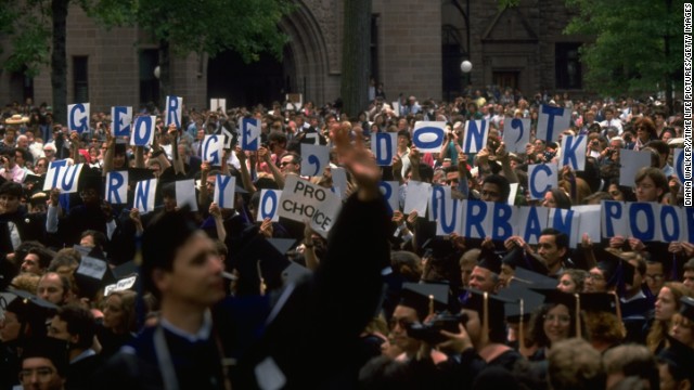 During a 1991 commencement speech given by President George H. W. Bush at Yale University, attendees hold signs that read, "George, don't turn your back on urban poor." Like Carter, Bush was more concerned with other issues during his presidency.