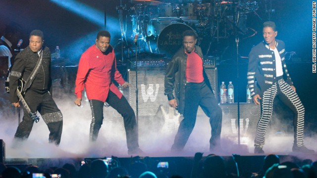 From left, Tito, Jackie, Marlon and Jermaine Jackson perform at the Staples Center last June in Los Angeles.