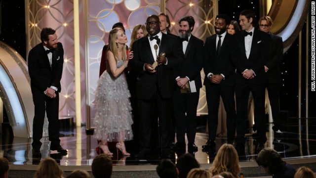 Director Steve McQueen and the cast of the film "12 Years a Slave" accept the award for best drama.