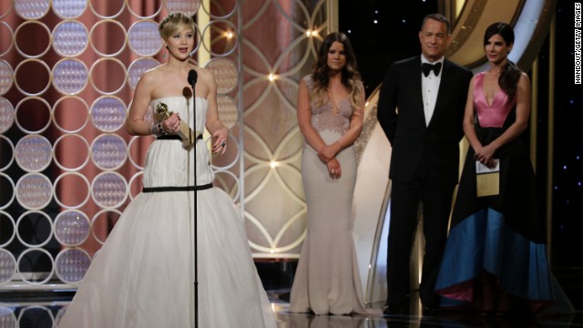 Lawrence accepts her award. The film also won best motion picture in the musical or comedy category.