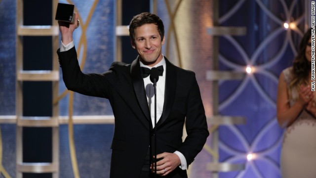 Andy Samberg accepts the award for best actor in a comedy TV series. His show "Brooklyn Nine-Nine" also won best series in its category.