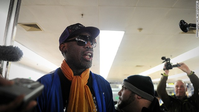 Former NBA player Dennis Rodman speaks to media on arriving at Beijing International Airport after a trip to North Korea.